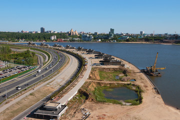 Reconstruction of coastal zone along transport dam. Kazan, Russia