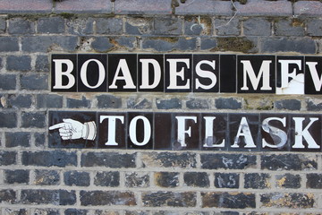 decorative tiles, writing, wall, street signs, London, U.K
