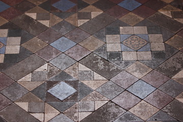detail of a beautiful old tiled floor with geometric patterns