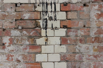 a beautifully degraded brick wall