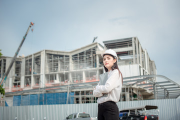 Asian women worker and engineer electrician work safety control at power plant energy industry