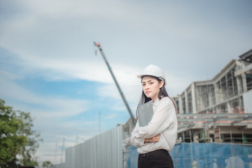 Asian women worker and engineer electrician work safety control at power plant energy industry