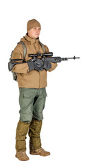 Fototapeta premium young soldier or sniper holding rifle. hunting, war, army, technology and people concept