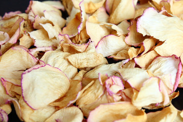 Fototapeta na wymiar Dried rose petals. Background. Close-up.