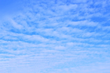 Beautiful sky and clouds in the form of waves. Background. Landscape.