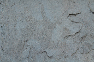 The wall is covered with plaster close-up. Cement. Background. Texture.