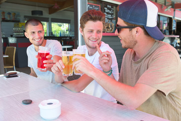 young men drinking liquor