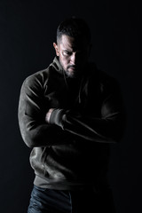 Fototapeta na wymiar Lifestyle for active and healthy man. Macho with beard wear casual clothes. Bearded man with hands folded in sweatshirt. Fashion model in stylish sportswear. Sport fashion and style, vintage filter