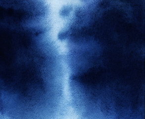 A dark blue watercolor background painted with hands on textured watercolor paper. Scanned in high resolution. Gradient from dark to light. Abstract Imitation of the night sky.