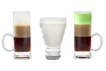 A set of alcoholic shots with liqueur and absinthe.