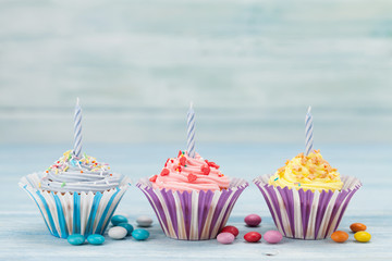 Sweet cupcakes with candles