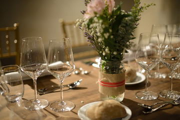 Wedding reception table decoration. Place setting.