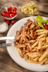 Greek gyros dis with fries and salad