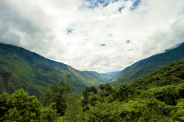 Jungle valley in Ollantaytambo (Peru) with the Urubamba River that runs through it