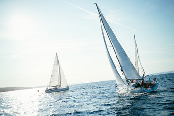 Portrait of sailing boats on open sea