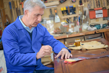 skilled wood worker working with wood