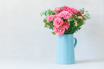 Beautiful bouquet of pink roses in vase