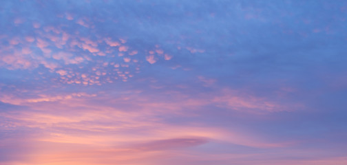 pinky soft clouds in the air at sunset background