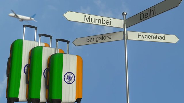 Travel baggage featuring flag of India, airplane and city sign post. Indian tourism conceptual animation