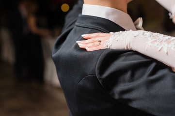 Woman put hand on man shoulder during dance