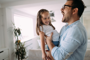 Happy family having fun time at home