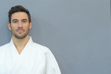 male athlete posing in kimono