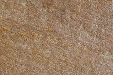 Texture of red untreated stone.