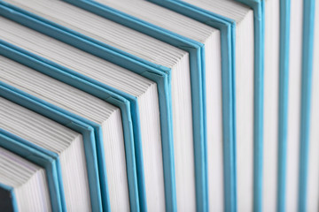 Background of a stack of blue books