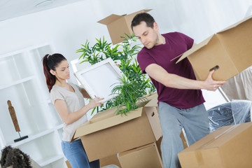 young couple moving in new home