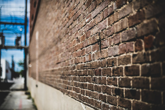 Brick wall with diminishing perspective and shallow depth of field