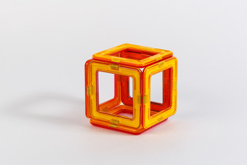 multi-colored children's plastic magnetic designer on isolated white background