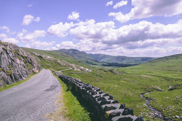 The scenic road of Healy Pass, a 12 km route worth of hairpin turns winding through the borderlands of County Cork and County Kerry in Ireland
