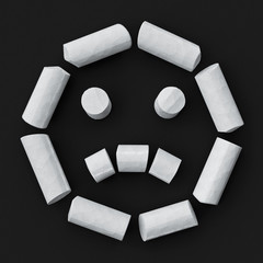 White blackboard chalks assembled like sad face emoticon on rough blackboard, 3D rendered