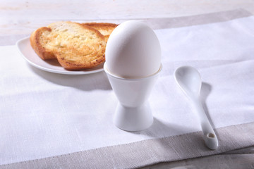 Morning Breakfast set with egg and bread toast on white background.