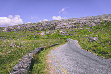 The scenic road of Healy Pass, a 12 km route worth of hairpin turns winding through the borderlands of County Cork and County Kerry in Ireland