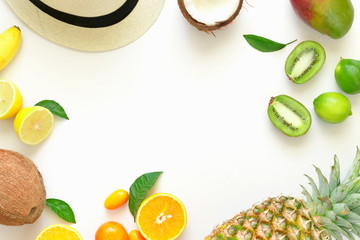 Summer composition. Hat, fresh fruits on white table background. Flat lay, top view, copy space 