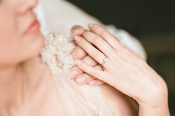 women's and men's hands wedding rings