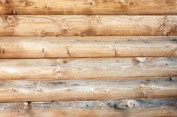 Natural background pattern of a log wall