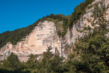 Fototapeta na wymiar Kinchkha waterfall near Okatse canyon, Imereti, Georgia