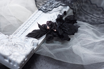 Black silk flower brooch