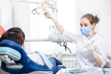 Dentist in Uniform to Prepare for the Procedure