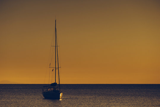 Fototapeta Yacht on sea water surface