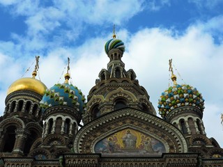 Fototapeta na wymiar Dome of Savior on the Spilled Blood in Saint Petersburg on a blue cloudy day