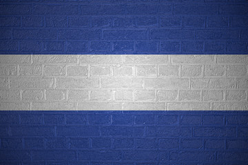 Flag of El Salvador on brick wall background, 3d illustration