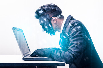The double exposure image of the hacker using a laptop overlay with binary code image and cityscape image. the concept of cyber attack, virus, malware, and cyber security.