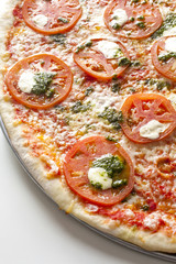 Tomato Mozzarella Pizza with Pesto