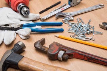 Construction Tools On Wooden Desk