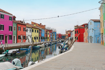 Fototapeta na wymiar Burano canal street with colorful houses