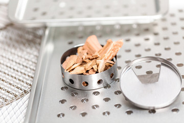 Stainless steel smoking pucks