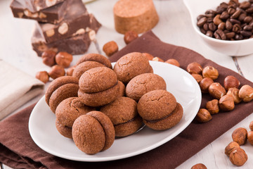 Hazelnut shortbread sandwiches filled with chocolate cream.